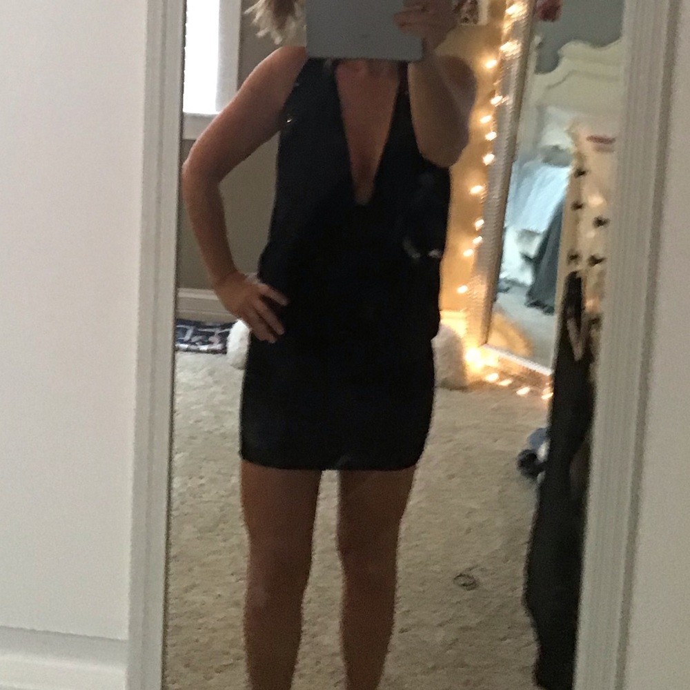 Very sexy little black dress. NWT. Halter top mini